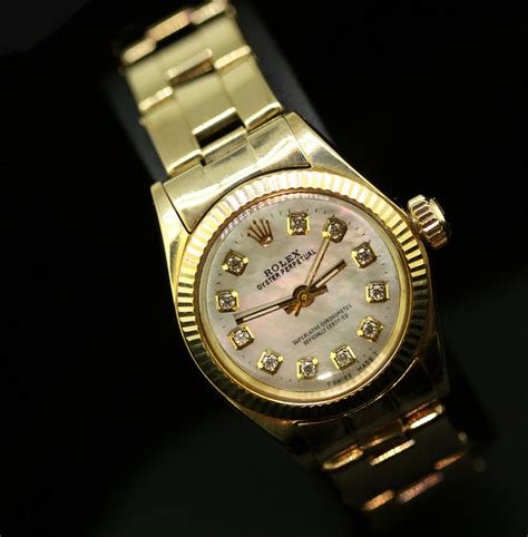 rolex oyster perpetual 14k gold rare womens watch|rolex oyster perpetual retail price.